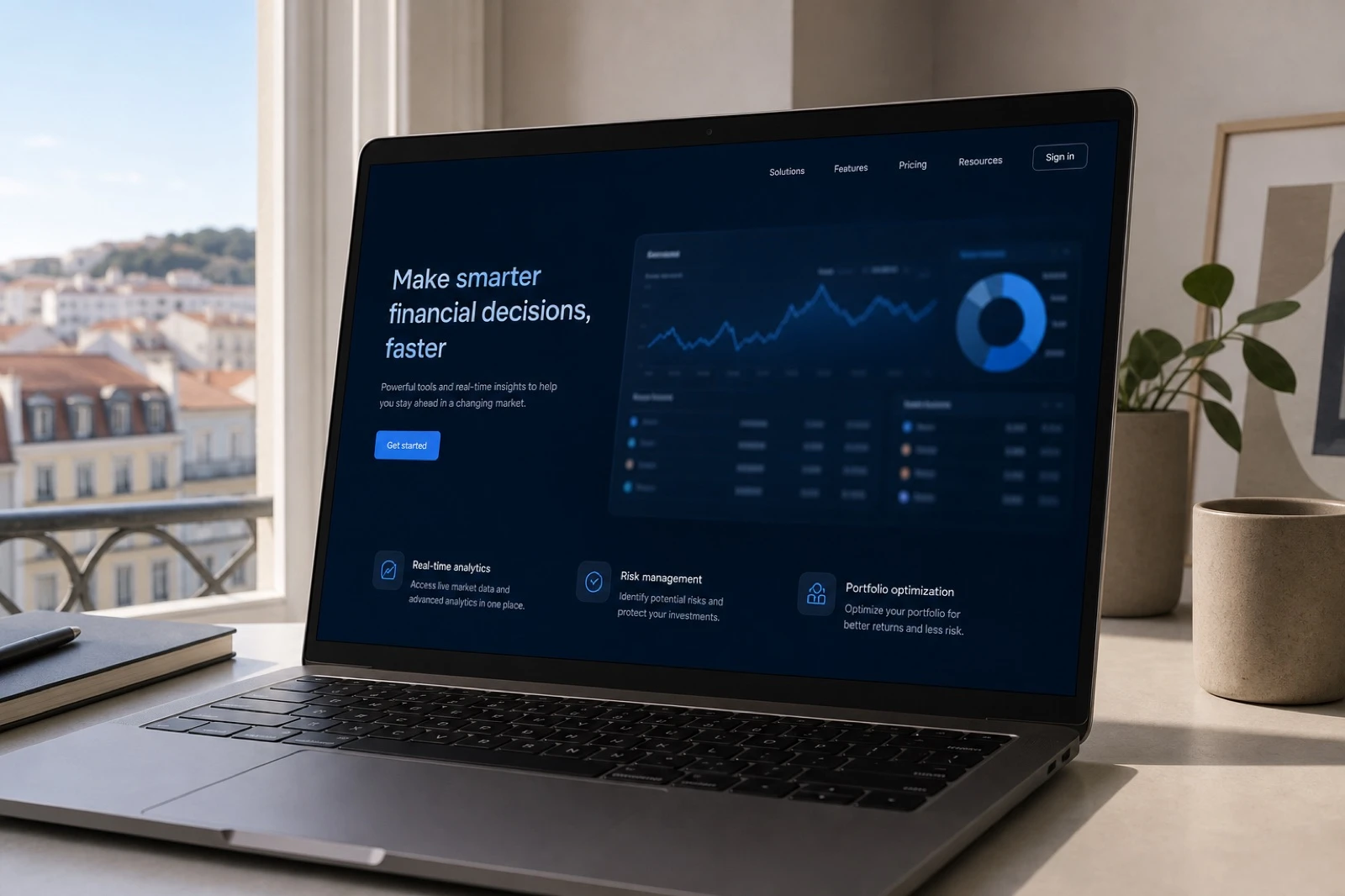 Laptop showing a fintech marketing website interface